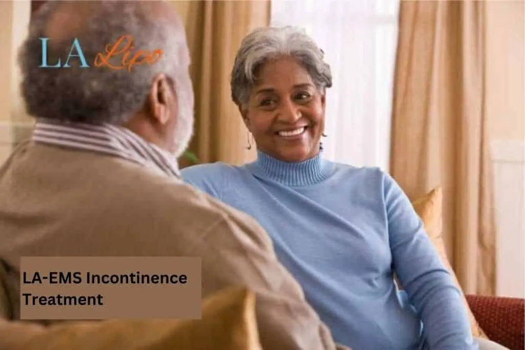 Couple sat smiling at each other - LA-EMS treatment Brownhills