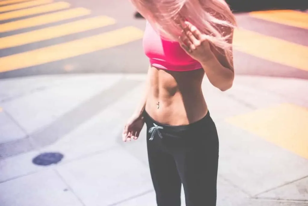 Woman with toned stomach after LA-EMS Body Sculpting Treatment Brownhills